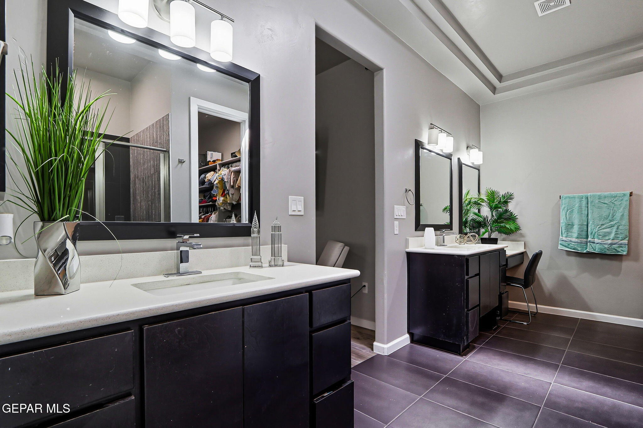 5812 Sundale Road El Paso, TX 79912 - Photo 42 of 47 a bathroom with a double vanity sink and a mirror