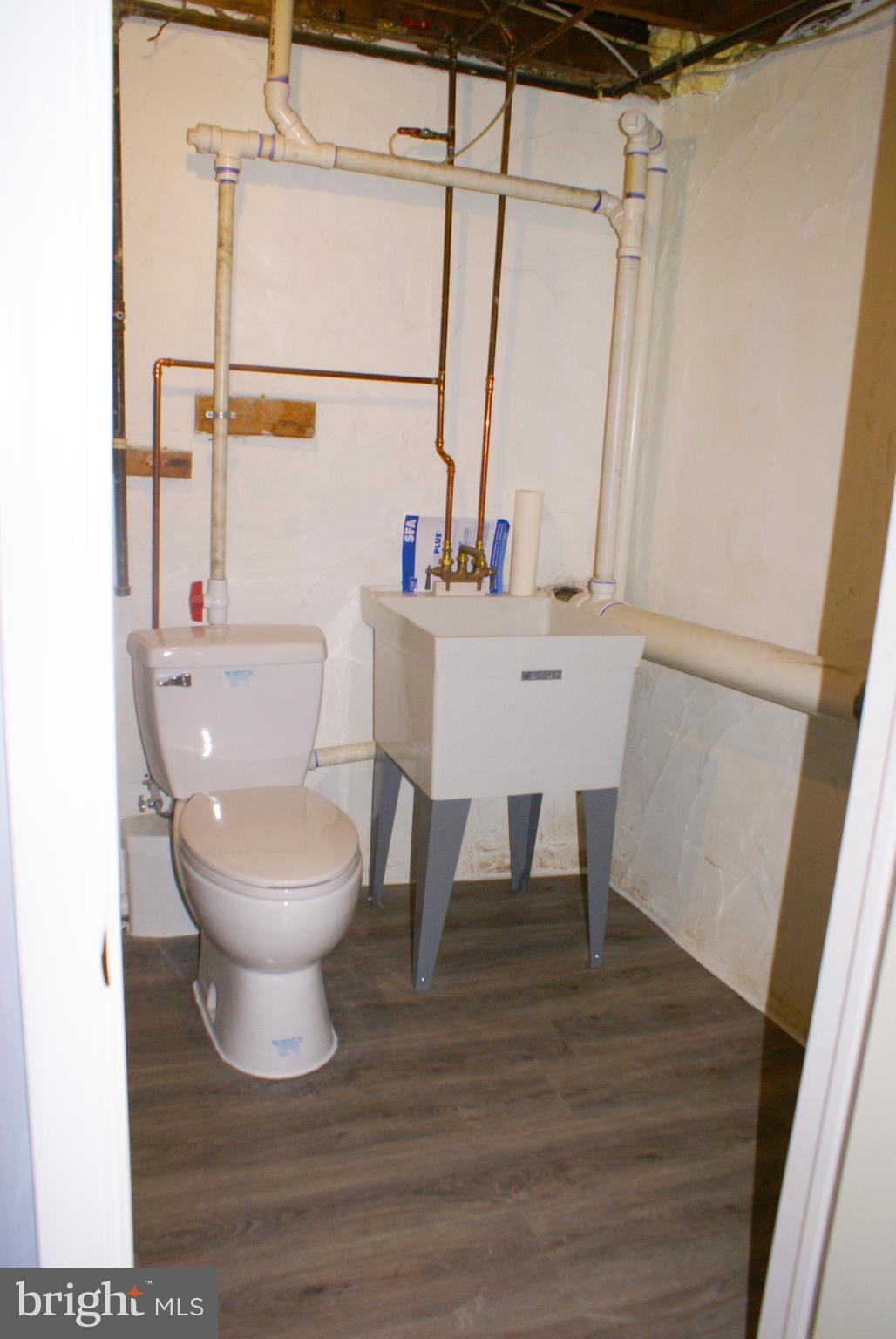 33 Belmar Road Hatboro, PA 19040 - Photo 22 of 27 Half Bath with Utility Sink in Basement