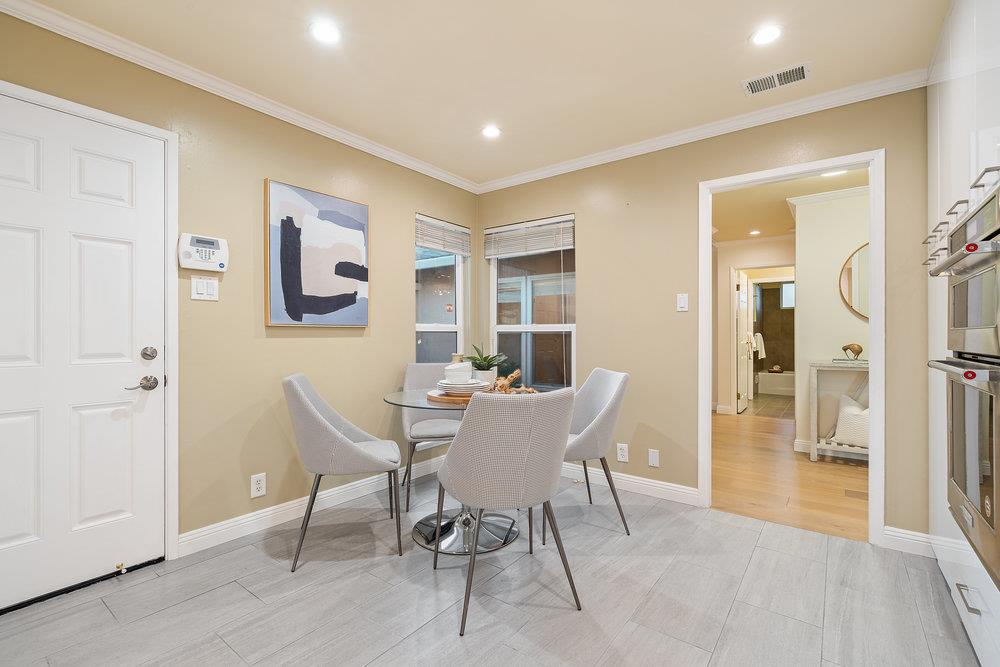 708 Morningside Drive Millbrae, CA 94030 - Photo 12 of 36 a view of a dining room with furniture and wooden floor