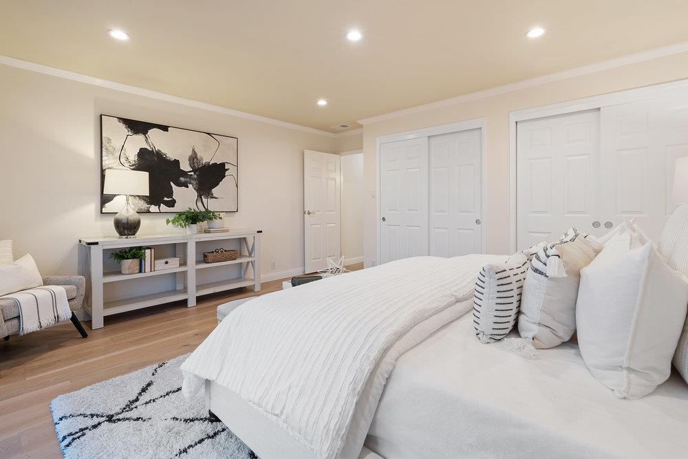 708 Morningside Drive Millbrae, CA 94030 - Photo 14 of 36 a spacious bedroom with a bed and a cabinets