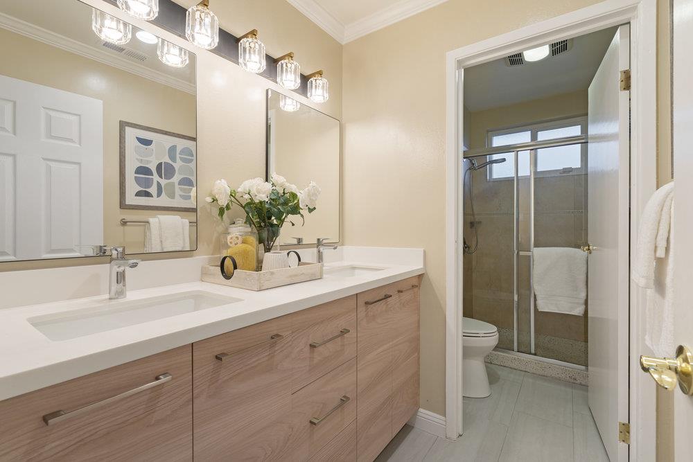 708 Morningside Drive Millbrae, CA 94030 - Photo 15 of 36 a bathroom with a double vanity sink mirror and toilet