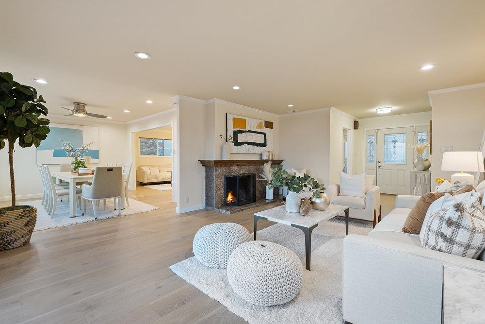 708 Morningside Drive Millbrae, CA 94030 - Photo 6 of 36 a living room with furniture and a fireplace