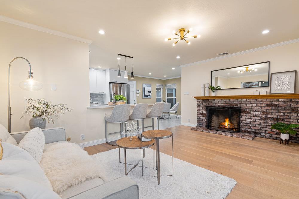 708 Morningside Drive Millbrae, CA 94030 - Photo 9 of 36 a living room with furniture and a fireplace