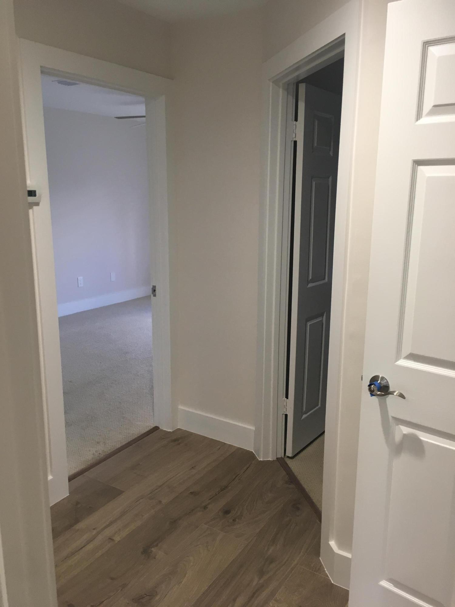23204 L'Ermitage Circle Boca Raton, FL 33433 - Photo 19 of 49 BEDROOM HALLWAY
