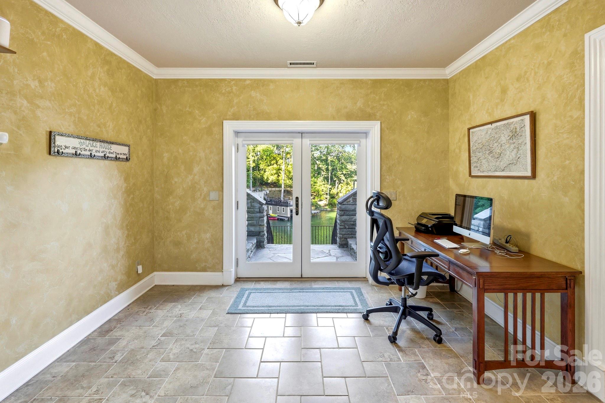 151 Garner Road Lake Lure, NC 28746 - Photo 30 of 48 a view of a workspace with furniture and a window