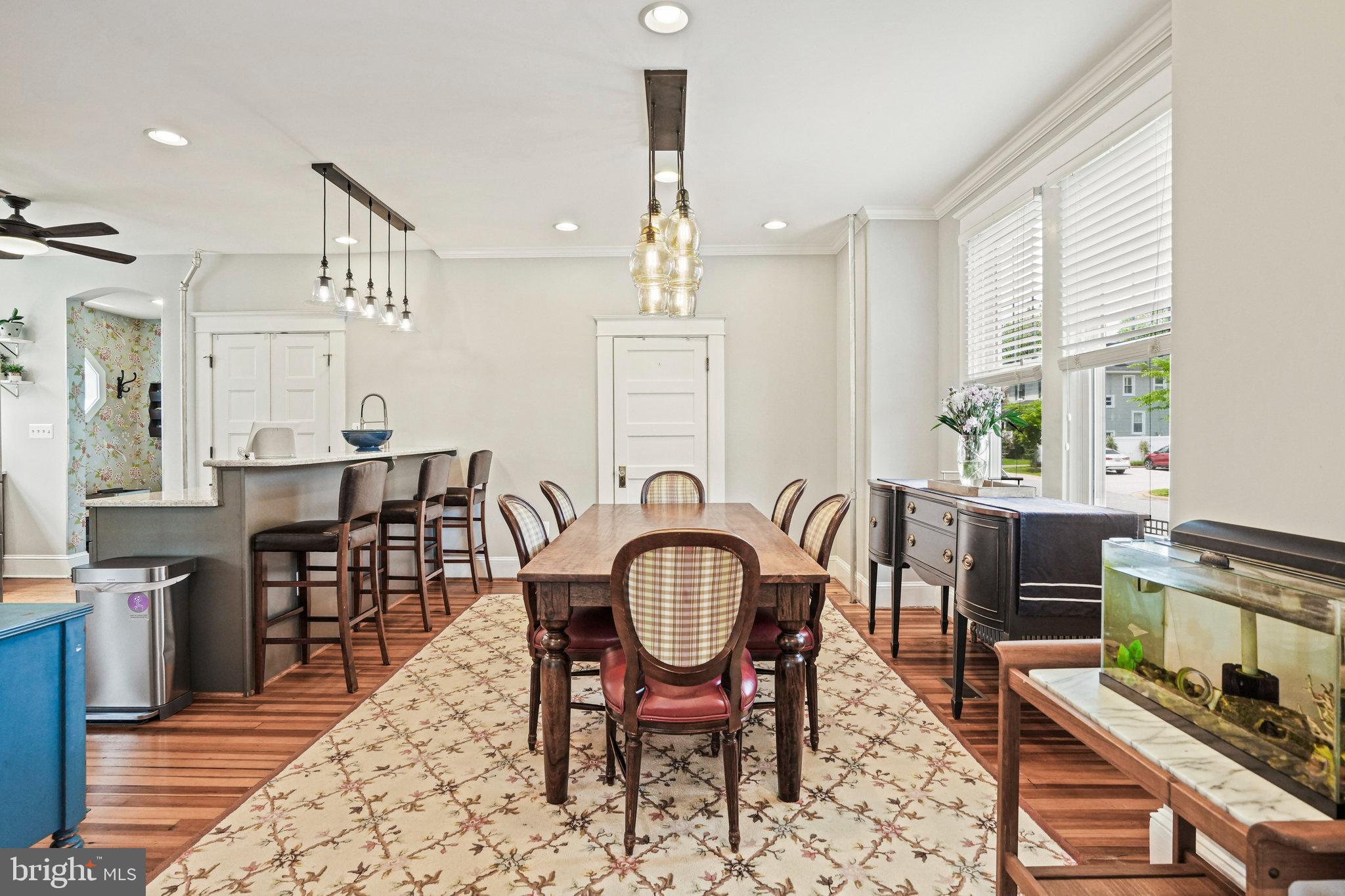 500 South Hammonds Ferry Road Linthicum Heights, MD 21090 - Photo 4 of 44 a view of a dining room with furniture window and wooden floor
