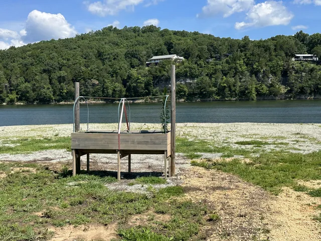 a view of a lake with a yard