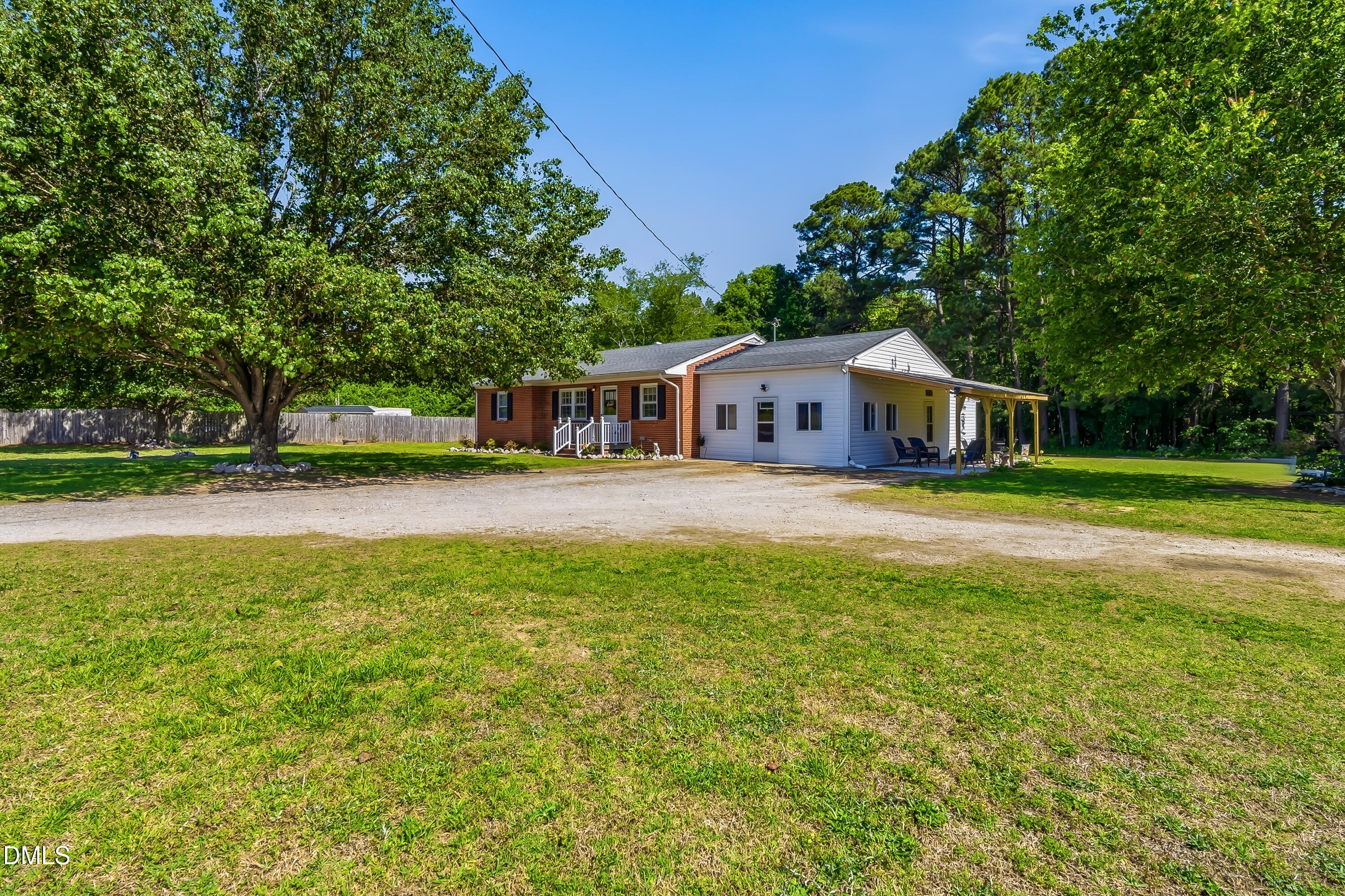 4967 Highway 581 Spring Hope, NC 27882 - Photo 3 of 44 a house view with swimming pool and green space