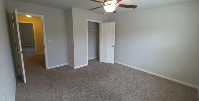 an empty room with a bathroom