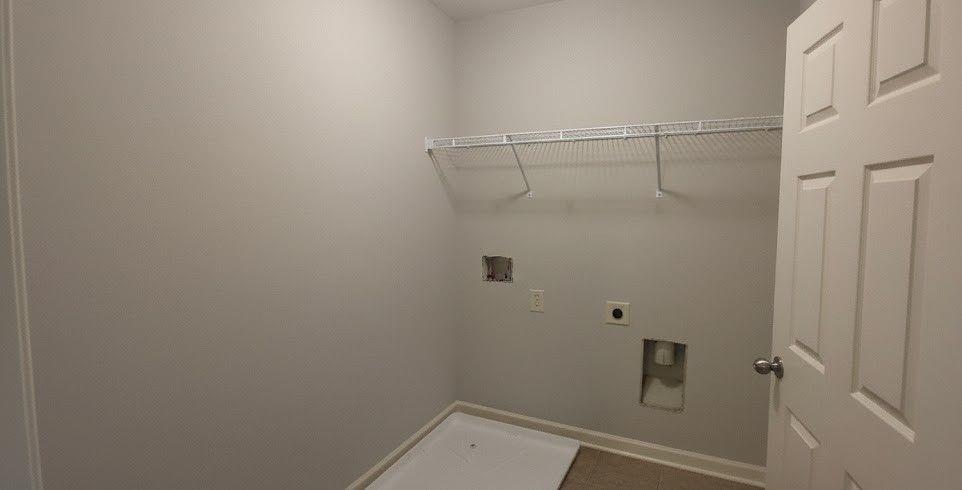 4191 Towncastle Lane Buford, GA 30518 - Photo 17 of 21 a bathroom with a shower and toilet