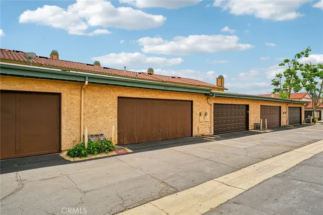 a front view of a house with a garage