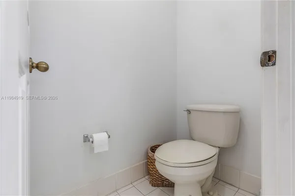 a bathroom with a toilet and a sink