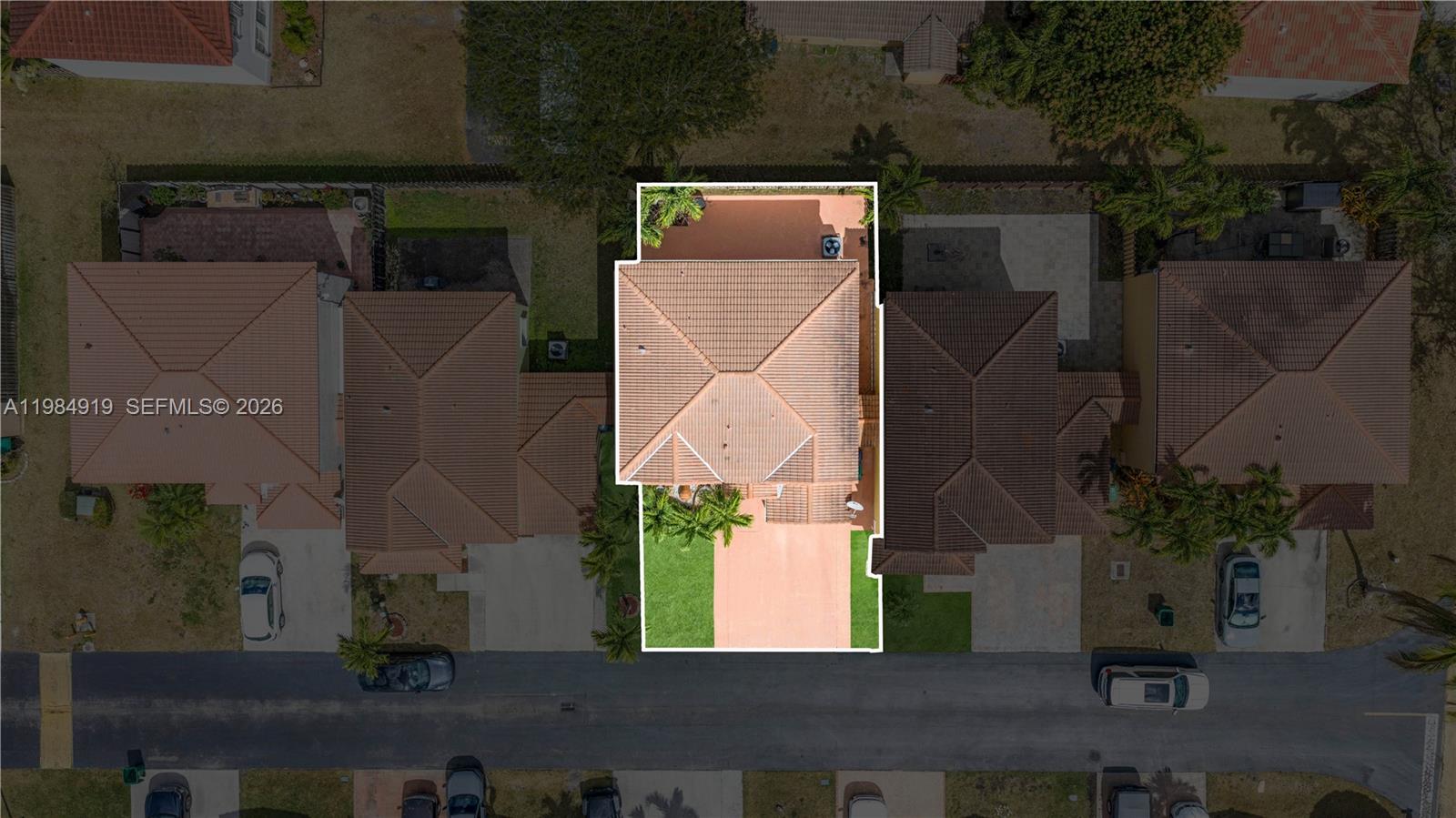 16323 Southwest 97th Street Miami, FL 33196 - Photo 44 of 44 an aerial view of a house with a yard and a garage