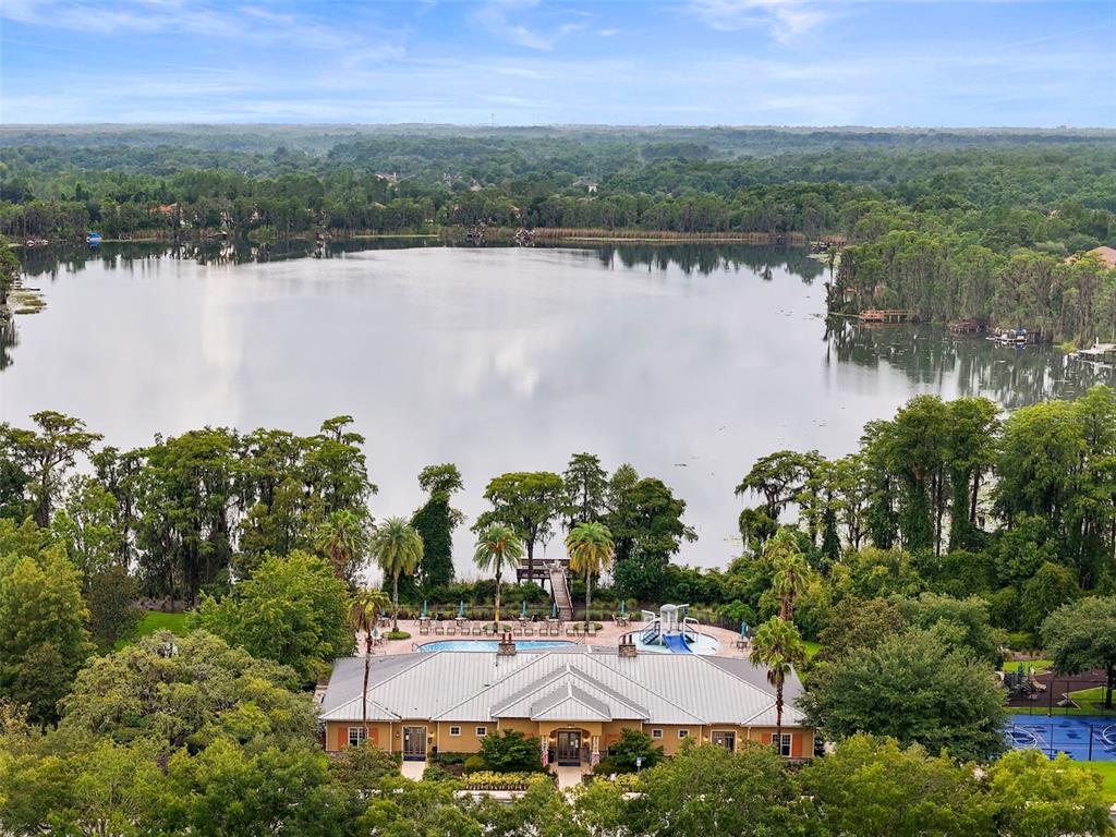 11807 Castine Street New Port Richey, FL 34654 - Photo 28 of 40 an aerial view of a house with a lake view