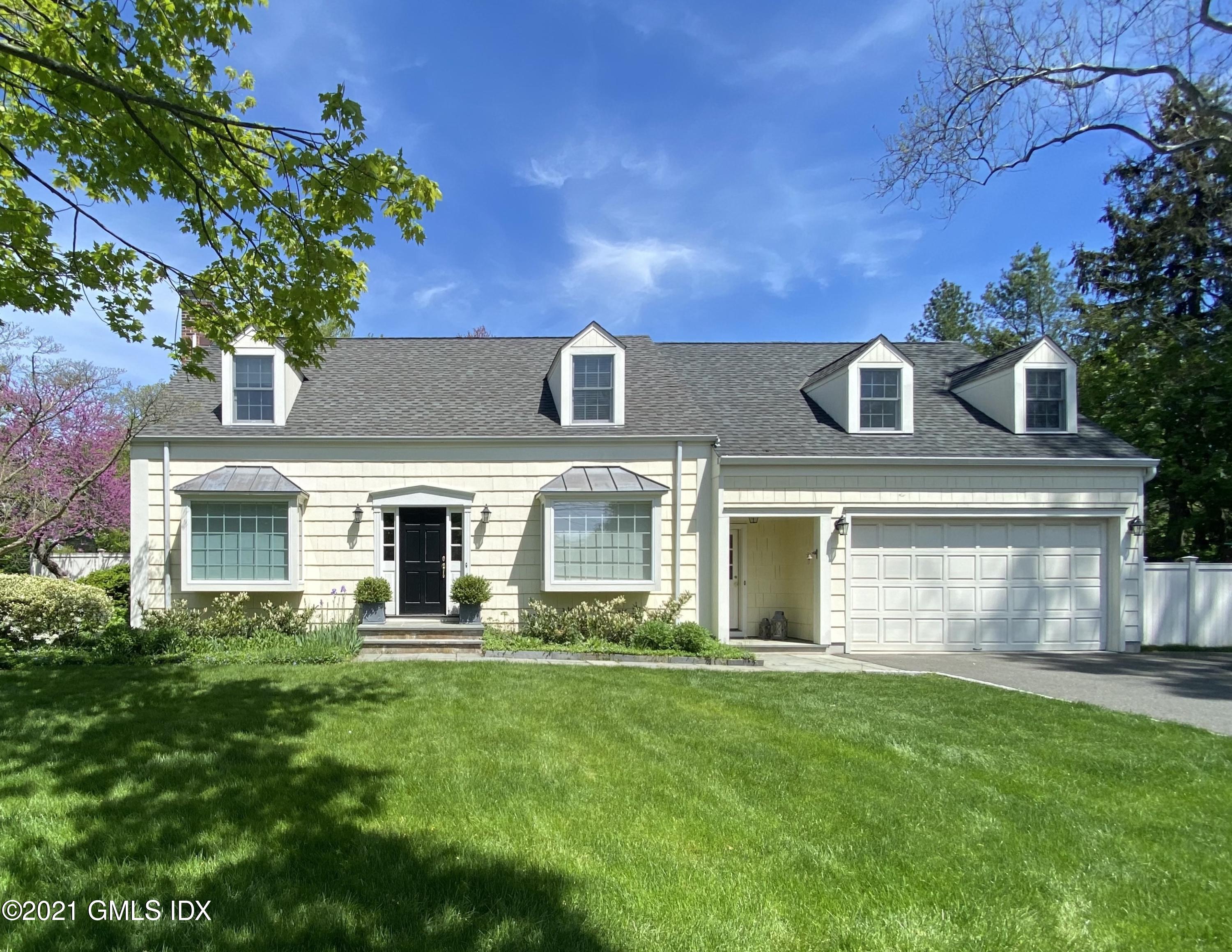 111 Lockwood Road Riverside, CT 06878 - Photo 1 of 35 front view of a house with a yard
