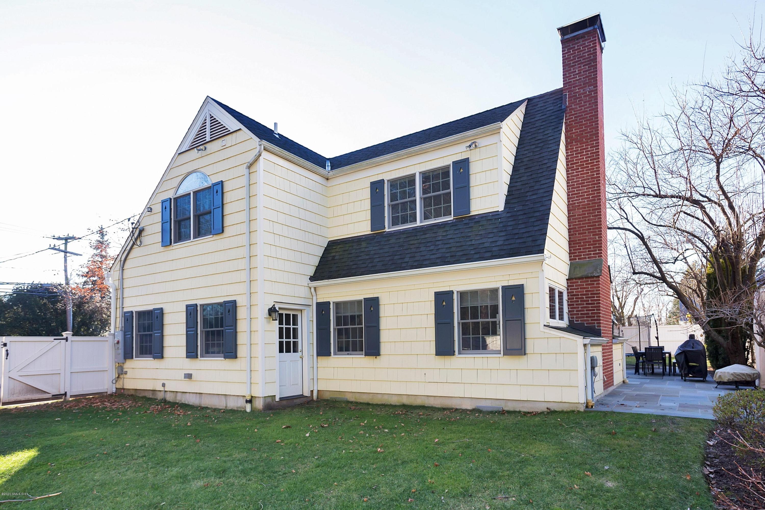 111 Lockwood Road Riverside, CT 06878 - Photo 28 of 35 a front view of a house with a yard