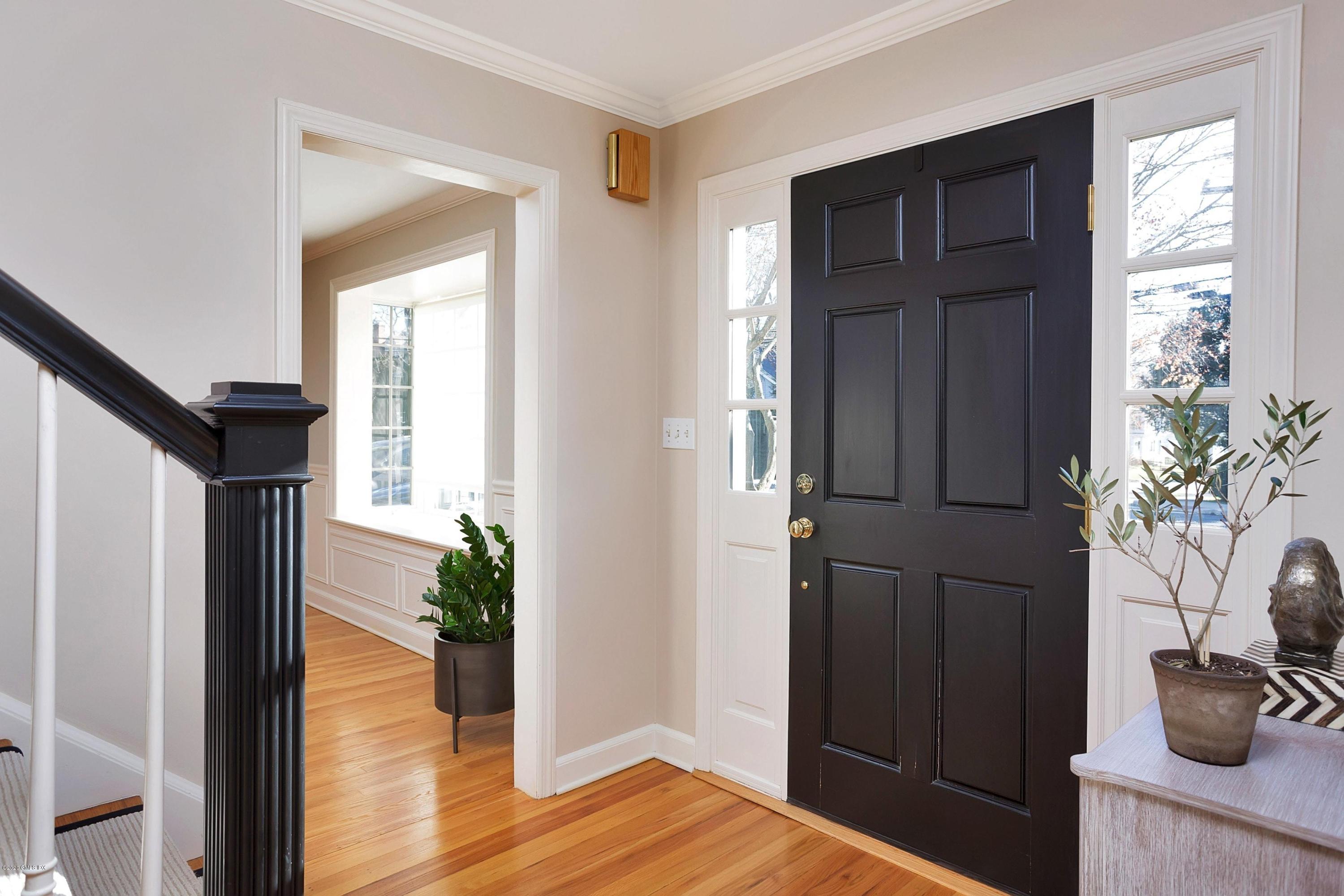 111 Lockwood Road Riverside, CT 06878 - Photo 4 of 35 a view of front door and wooden floor