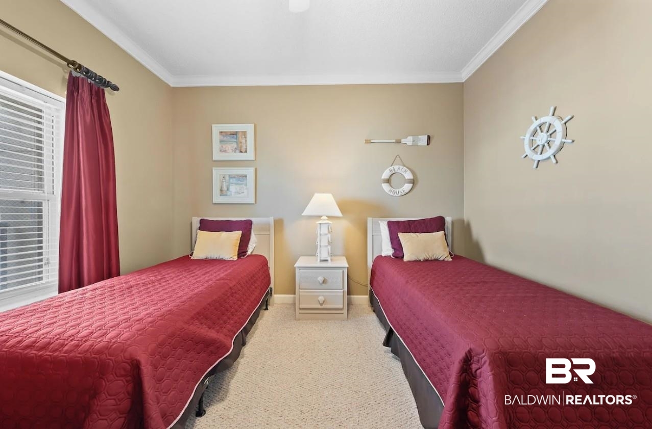 27770 Canal Road, Unit 2502 Orange Beach, AL 36561 - Photo 20 of 55 Carpeted bedroom with ornamental molding and a ceiling fan