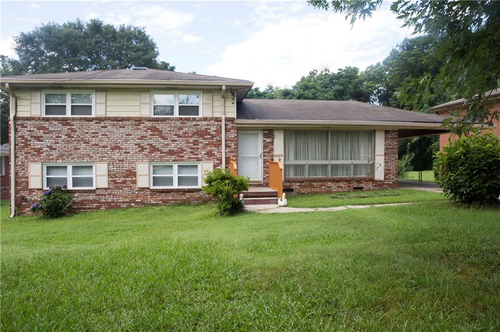 2277 Miriam Lane Decatur, GA 30032 - Photo 1 of 1 a view of a house with a yard and plants