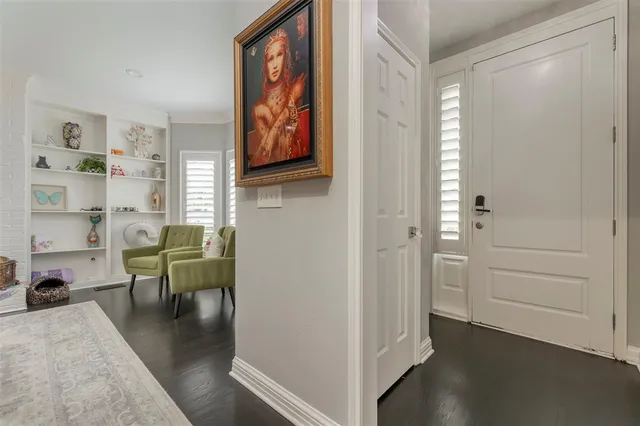 a view of a livingroom with furniture and workspace