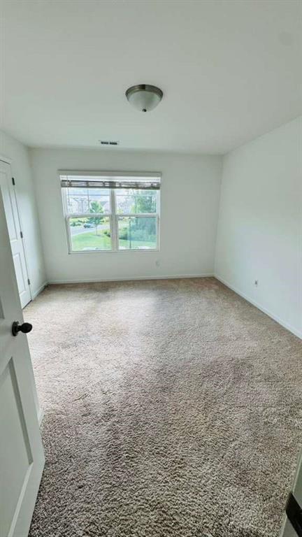 4078 Haleston Road Duluth, GA 30097 - Photo 13 of 25 an empty room with windows