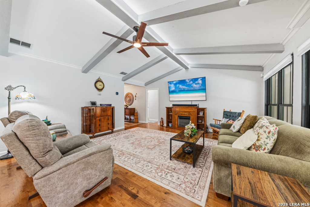 6022 Winding Ridge Drive Windcrest, TX 78239 - Photo 7 of 31 a living room with furniture and a fireplace