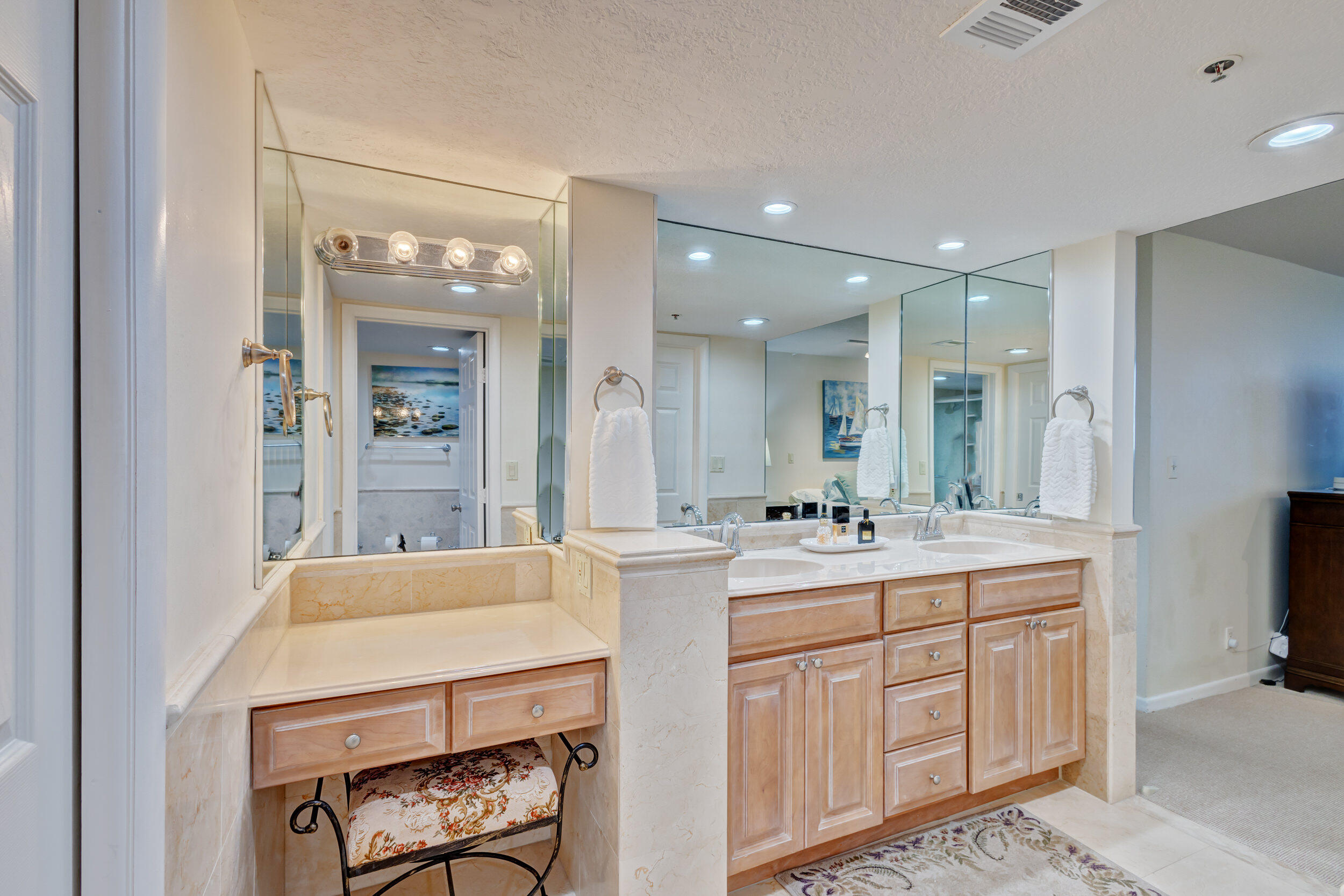 600 Ocean Drive, Unit 11A Juno Beach, FL 33408 - Photo 28 of 51 a kitchen with a sink a stove and cabinets