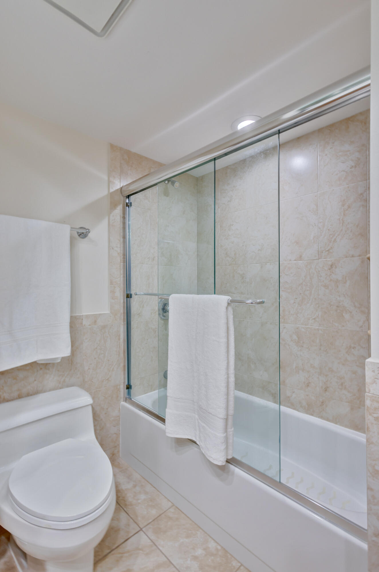 600 Ocean Drive, Unit 11A Juno Beach, FL 33408 - Photo 33 of 51 a bathroom with a toilet and a shower