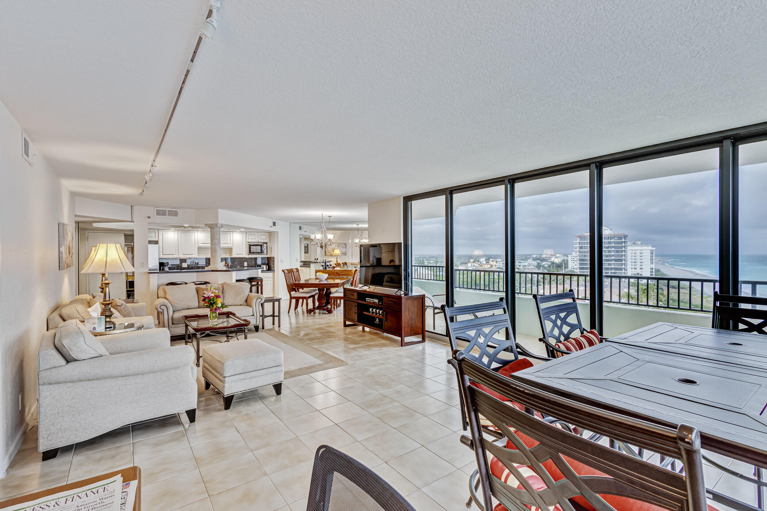 600 Ocean Drive, Unit 11A Juno Beach, FL 33408 - Photo 10 of 51 a living room with furniture and a large window