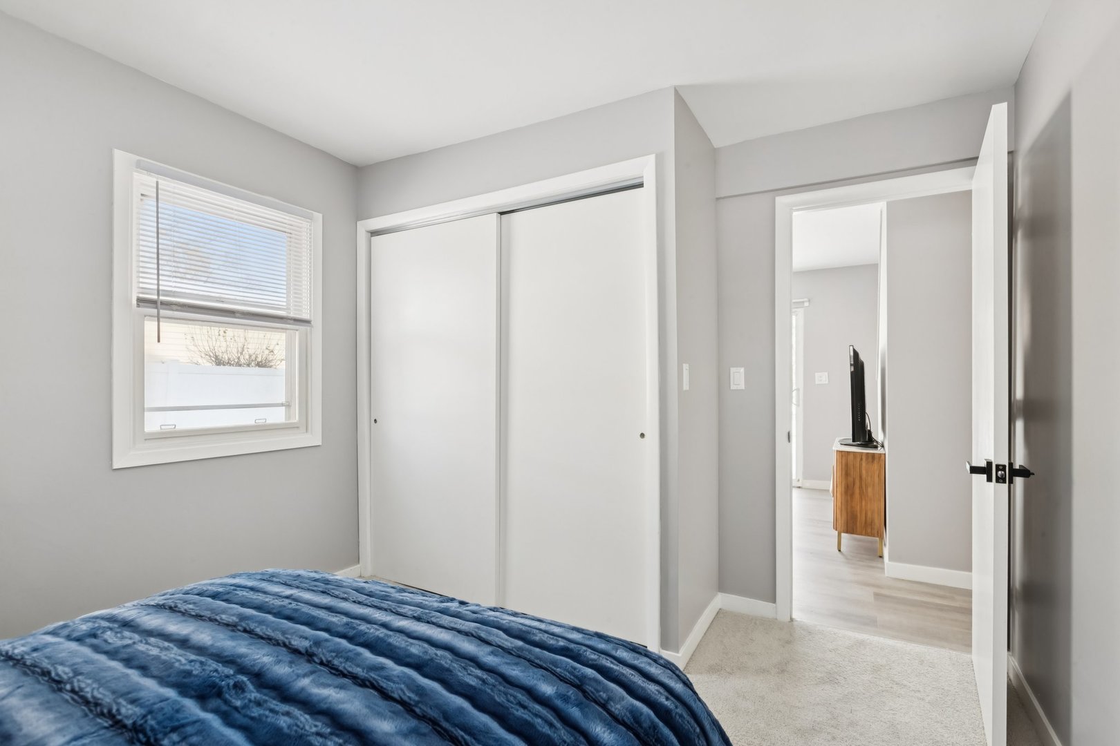 4N327 7th Avenue Addison, IL 60101 - Photo 24 of 49 a bedroom with a bed and a window