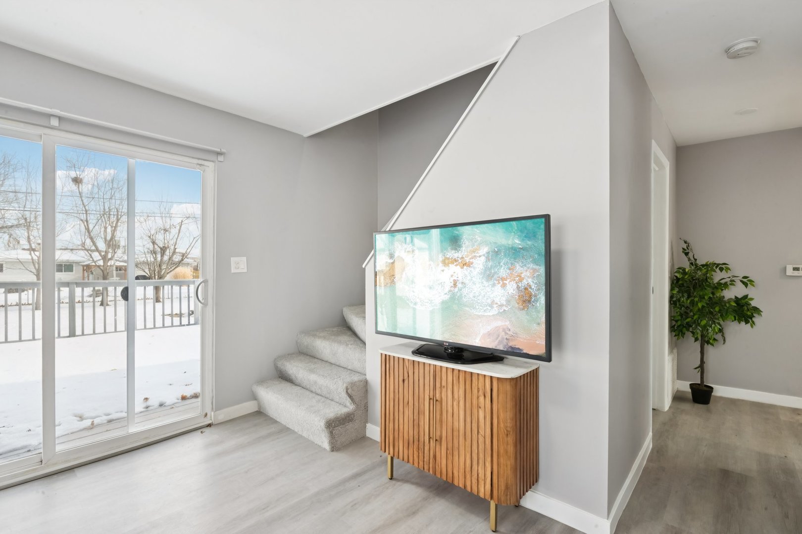 4N327 7th Avenue Addison, IL 60101 - Photo 25 of 49 a living room with furniture and a flat screen tv