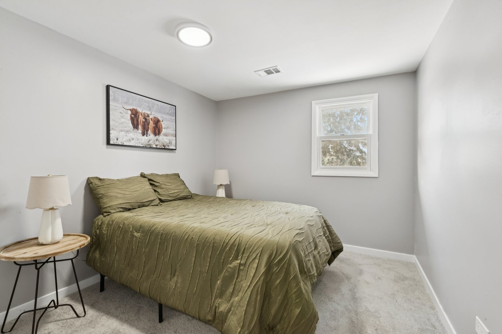 4N327 7th Avenue Addison, IL 60101 - Photo 31 of 49 a bedroom with a bed and a painting on the wall