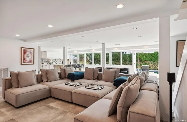 a view of kitchen with furniture and wooden floor