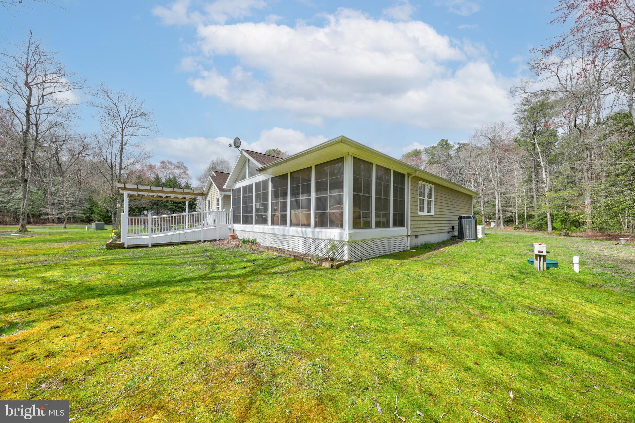 22371 Deep Branch Road Georgetown, DE 19947 - Photo 3 of 78 Large enclosed porch with multi level deck