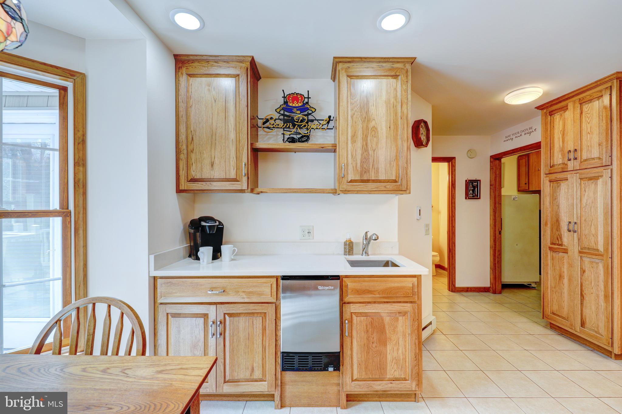 22371 Deep Branch Road Georgetown, DE 19947 - Photo 23 of 78 New wet bar addition with built in icemaker