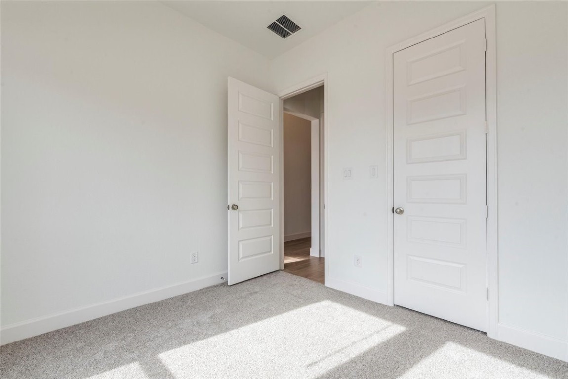 164 Kimble Creek Loop Kyle, TX 78640 - Photo 18 of 35 a view of an empty room