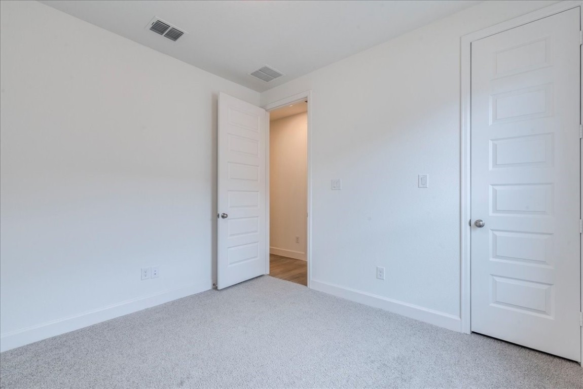 164 Kimble Creek Loop Kyle, TX 78640 - Photo 21 of 35 a view of an empty room