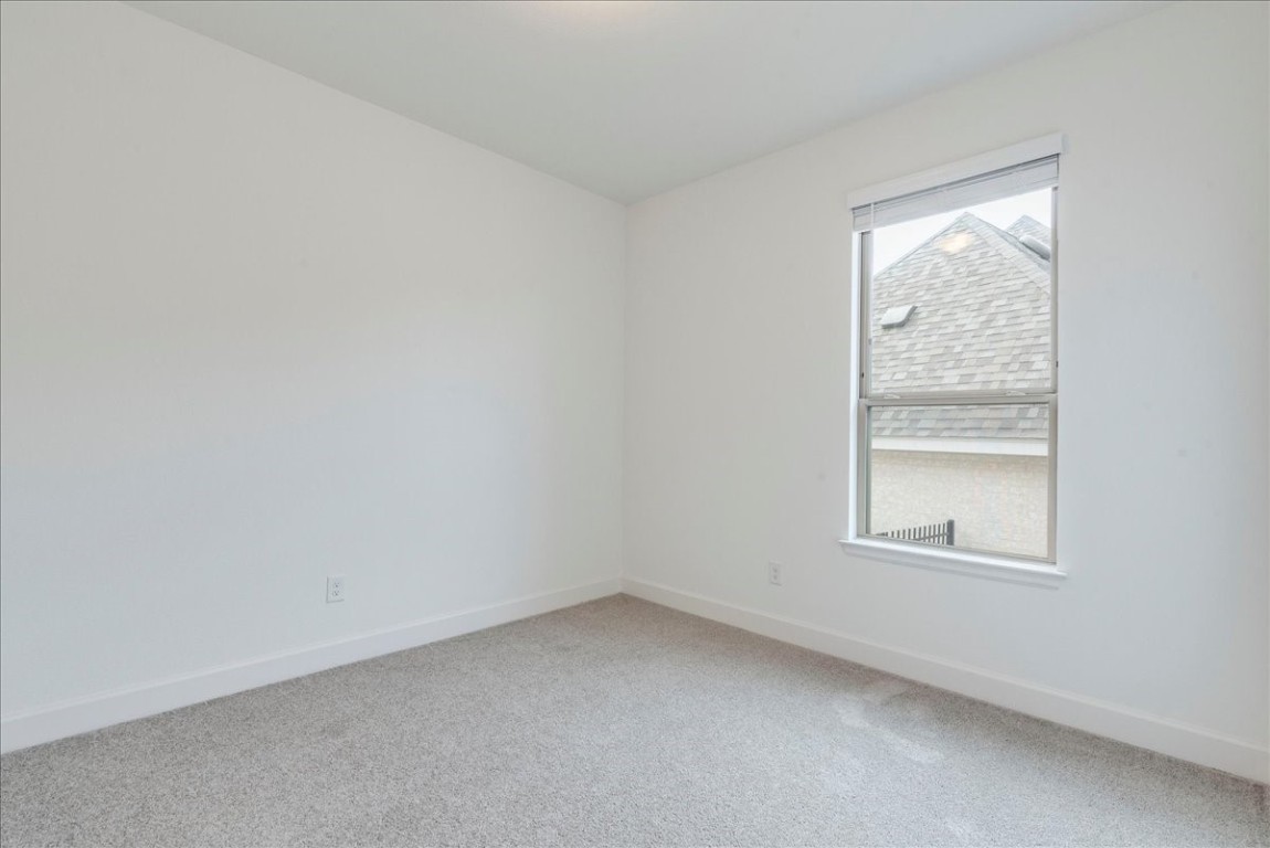 164 Kimble Creek Loop Kyle, TX 78640 - Photo 22 of 35 an empty room with a window