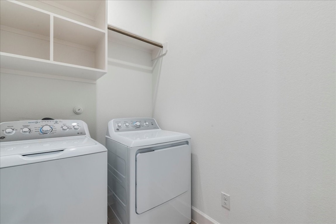 164 Kimble Creek Loop Kyle, TX 78640 - Photo 25 of 35 a utility room with dryer and washer