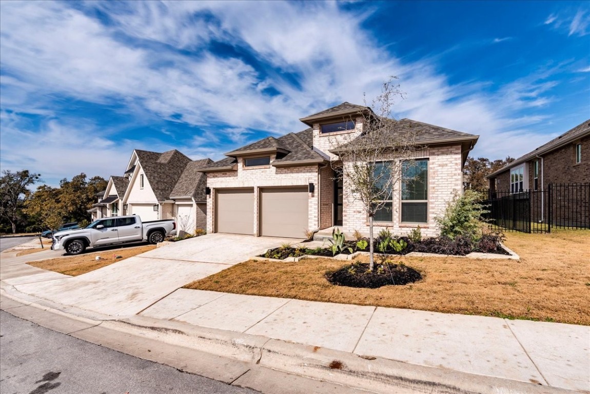 164 Kimble Creek Loop Kyle, TX 78640 - Photo 4 of 35 a view of a house with entertaining space