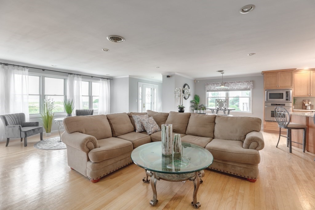 175 Rice Avenue Revere, MA 02151 - Photo 12 of 30 a living room with furniture and a large window