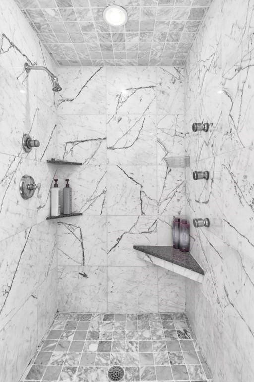 175 Rice Avenue Revere, MA 02151 - Photo 21 of 30 a vase of flowers sitting on a floor