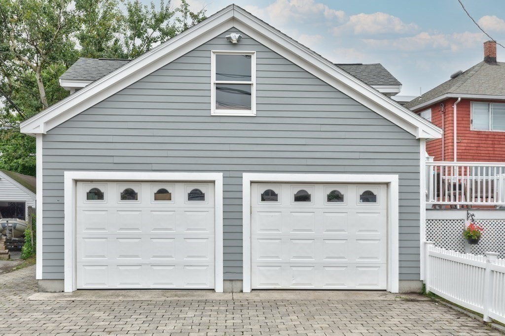 175 Rice Avenue Revere, MA 02151 - Photo 25 of 30 a front view of a house with a garage