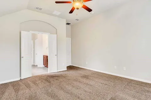 an empty room with windows