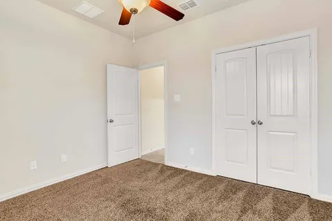 a view of small space with racks on the wall