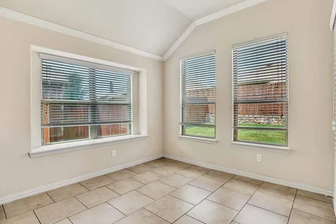a view of kitchen with windows