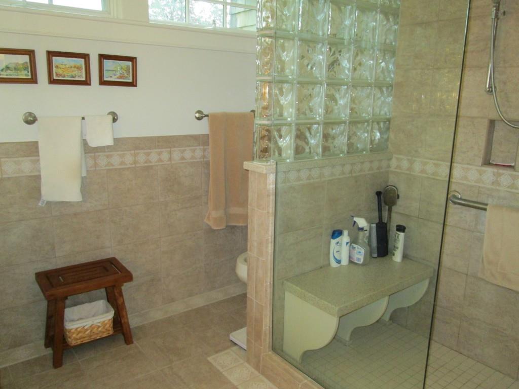 144 Perkins Street Castine, ME 04421 - Photo 12 of 21 Transom windows flood the master...