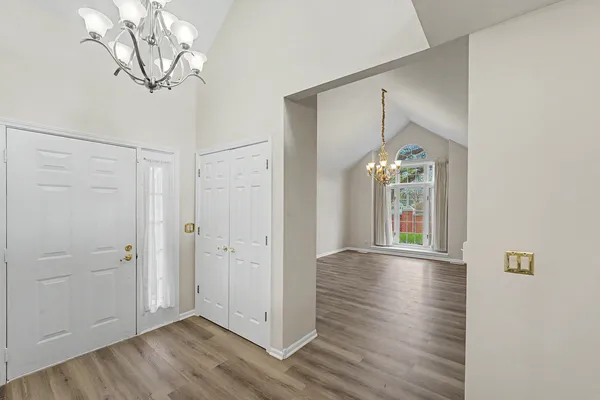 a view of livingroom with hardwood floor and hallway