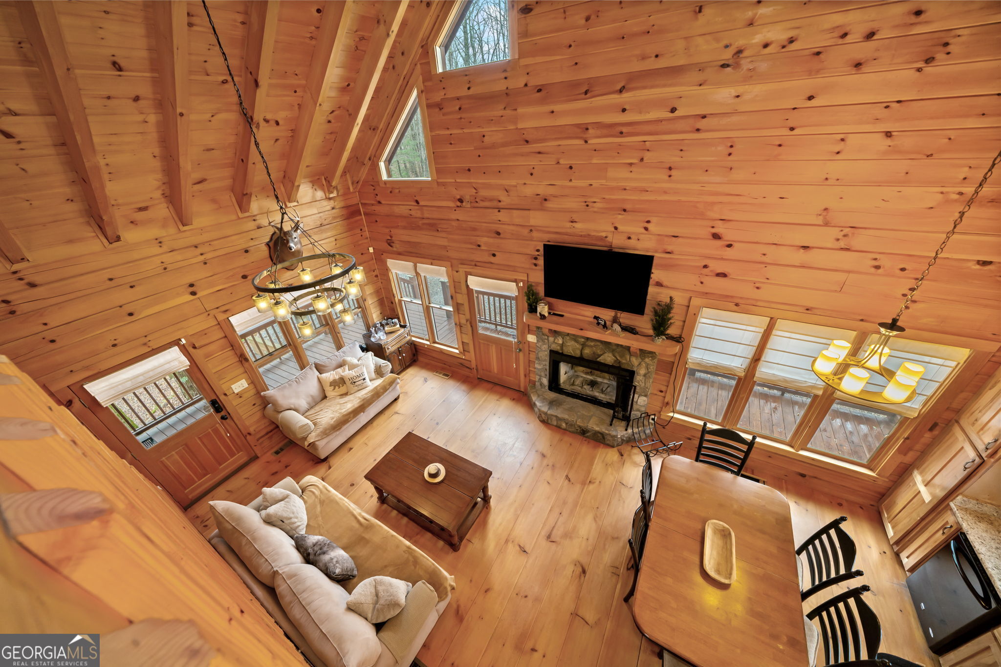 541 Little Bushy Head Road, Unit 271 Blue Ridge, GA 30513 - Photo 11 of 43 a view of a fireplace with wooden floor