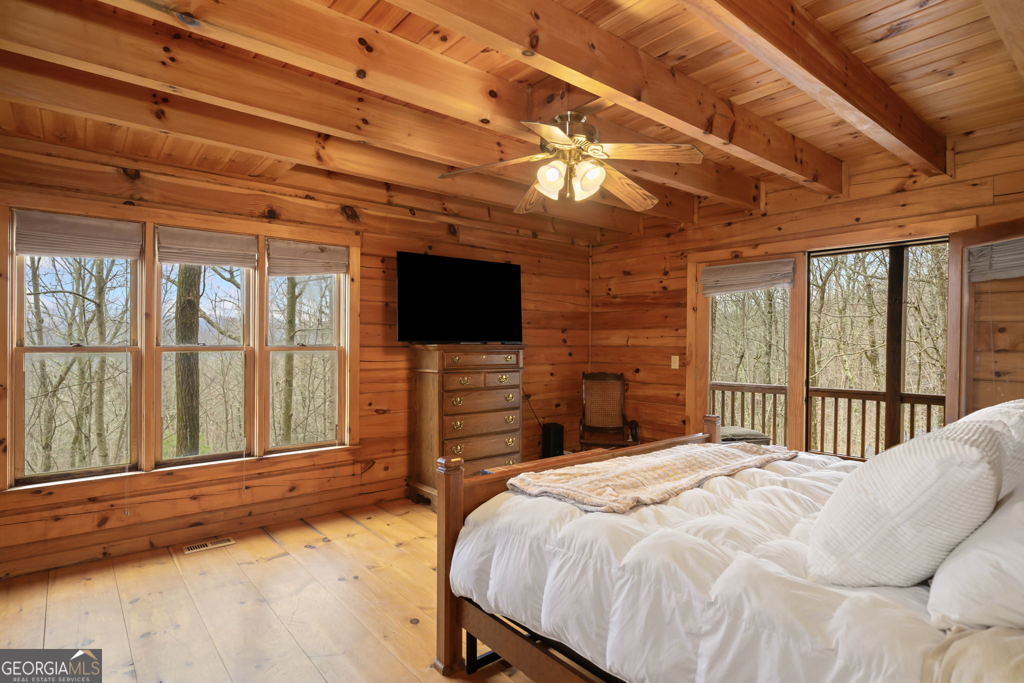 541 Little Bushy Head Road, Unit 271 Blue Ridge, GA 30513 - Photo 14 of 43 a bedroom with a bed and a flat screen tv